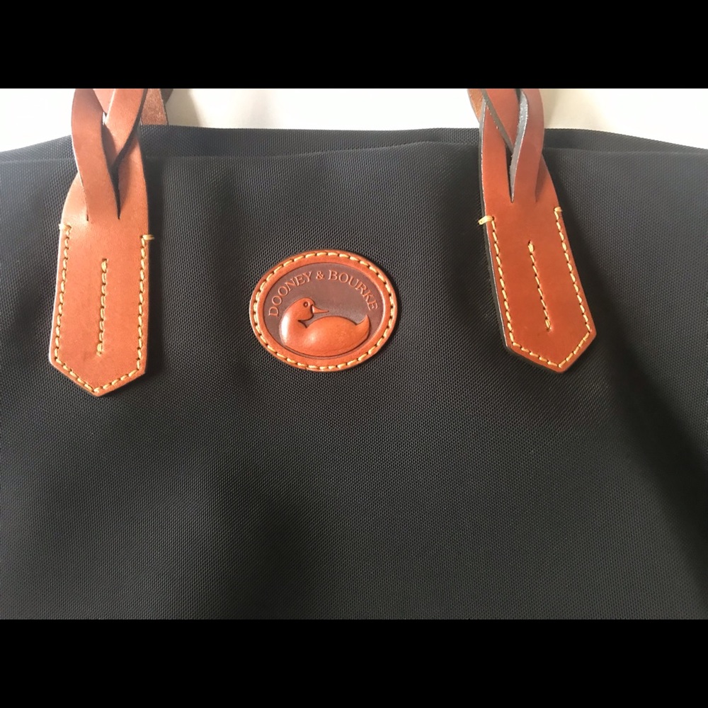 Dooney and Burke black nylon bag with tan leather trim